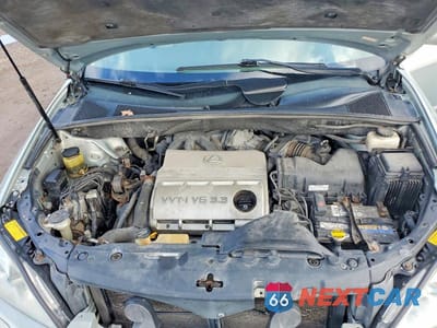 Zdjęcie 12 z 13 samochodu: 2006 LEXUS RX 330 VIN:2T2HA31U56C105713 - miniatura
