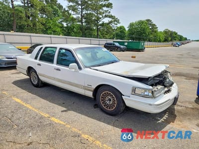 Czwarte zdjęcie samochodu z boku: 1997 LINCOLN TOWN CAR EXECUTIVE VIN:1LNLM81W7VY668840 - miniatura