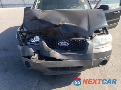 Zdjęcie 12 z 13 samochodu: 2005 FORD ESCAPE XLS VIN:1FMYU02Z75KC90439 - miniatura