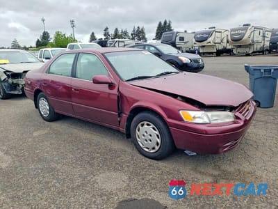 Czwarte zdjęcie samochodu z boku: 1997 TOYOTA CAMRY LE VIN:JT2BG22KXV0029844 - miniatura