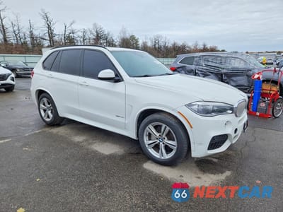 Czwarte zdjęcie samochodu z boku: 2015 BMW X5 XDRIVE50I VIN:5UXKR6C56F0J74638 - miniatura