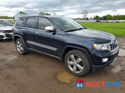 Czwarte zdjęcie samochodu z boku: 2011 JEEP GRAND CHEROKEE OVERLAND VIN:1J4RR6GG9BC608632 - miniatura