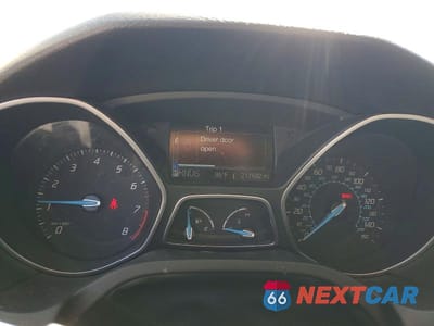 Zdjęcie 9 z 11 samochodu: 2012 FORD FOCUS TITANIUM VIN:1FAHP3N26CL257926 - miniatura