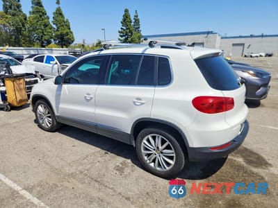 Drugie zdjęcie samochodu z przodu: 2014 VOLKSWAGEN TIGUAN S VIN:WVGAV3AX4EW550496 - miniatura