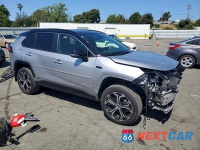 Czwarte zdjęcie samochodu z boku: 2024 TOYOTA RAV4 PRIME XSE VIN:JTMEB3FV9RD210669 - miniatura