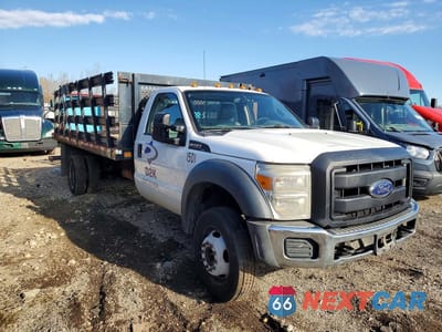 Czwarte zdjęcie samochodu z boku: 2015 FORD F450 SUPER DUTY FLATBED TRUCK VIN:1FDTF4GY4FEA53323 - miniatura