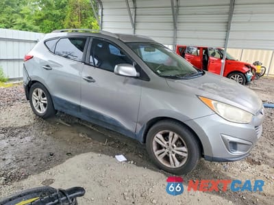 Czwarte zdjęcie samochodu z boku: 2011 HYUNDAI TUCSON GLS VIN:KM8JU3AC9BU263145 - miniatura