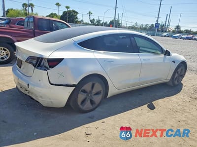Trzecie zdjęcie samochodu z tyłu: 2020 TESLA MODEL 3 VIN:5YJ3E1EA8LF659472 - miniatura