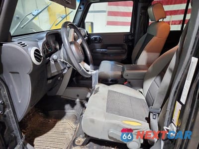 Zdjęcie 7 z 12 samochodu: 2010 JEEP WRANGLER UNLIMITED SAHARA VIN:1J4BA5H17AL116967 - miniatura