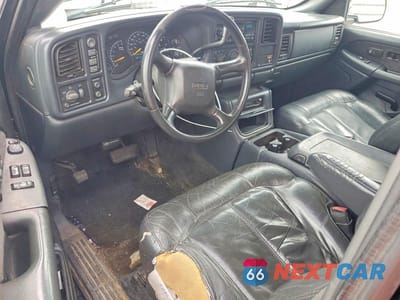 Zdjęcie 8 z 11 samochodu: 2000 GMC NEW SIERRA K1500 VIN:1GTEK19T2YE289514 - miniatura