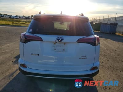 Zdjęcie 6 z 12 samochodu: 2018 TOYOTA RAV4 HYBRID XLE VIN:JTMRJREV4JD175228 - miniatura