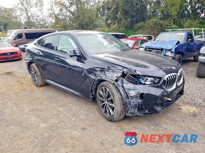 Czwarte zdjęcie samochodu z boku: 2025 BMW X6 XDRIVE40I VIN:5UX33EX02S9X29007 - miniatura