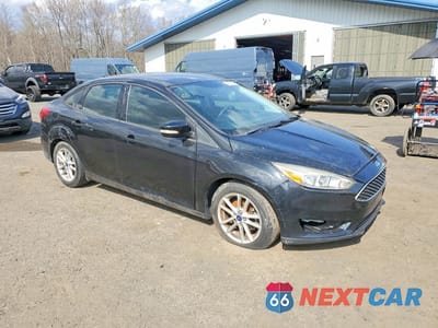 Czwarte zdjęcie samochodu z boku: 2015 FORD FOCUS SE VIN:1FADP3F21FL213723 - miniatura