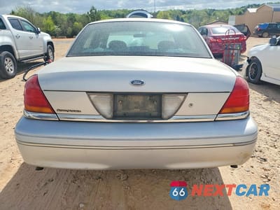 Zdjęcie 6 z 12 samochodu: 2000 FORD CROWN VICTORIA POLICE INTERCEPTOR VIN:2FAFP71W1YX101634 - miniatura