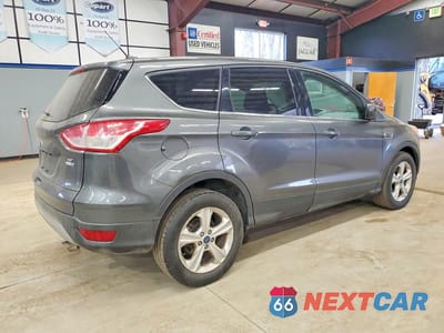 Trzecie zdjęcie samochodu z tyłu: 2015 FORD ESCAPE SE VIN:1FMCU9GX8FUC58059 - miniatura