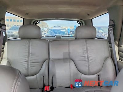 Zdjęcie 10 z 14 samochodu: 1999 GMC JIMMY VIN:1GKDT13WXX2549416 - miniatura