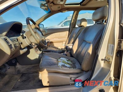 Zdjęcie 7 z 12 samochodu: 1999 NISSAN MAXIMA SE LIMITED VIN:JN1CA21AXXT104682 - miniatura