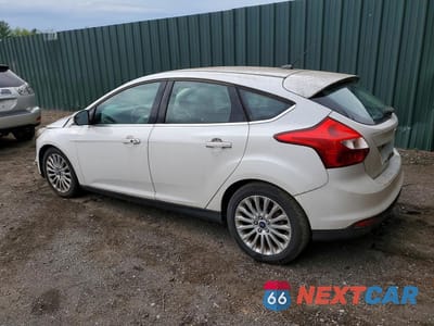 Drugie zdjęcie samochodu z przodu: 2012 FORD FOCUS TITANIUM VIN:1FAHP3N22CL309097 - miniatura