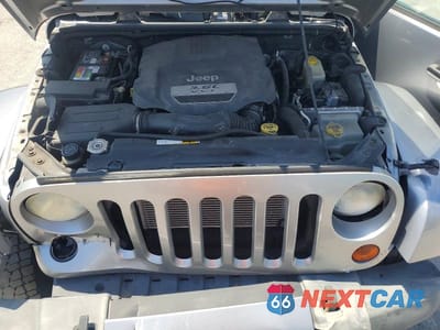 Zdjęcie 12 z 12 samochodu: 2013 JEEP WRANGLER UNLIMITED SPORT VIN:1C4HJWDG3DL591052 - miniatura