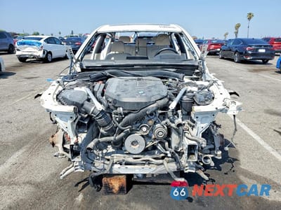 Piąte zdjęcie samochodu w środku: 2021 BMW 740 I VIN:WBA7T2C07MCF88819 - miniatura