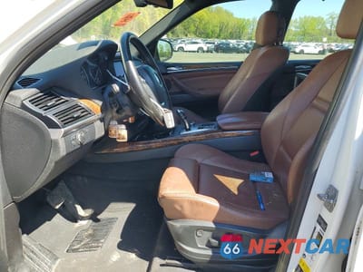 Zdjęcie 7 z 13 samochodu: 2012 BMW X5 XDRIVE50I VIN:5UXZV8C56CL425836 - miniatura