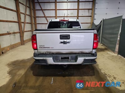 Zdjęcie 6 z 12 samochodu: 2018 CHEVROLET COLORADO LT VIN:1GCGTCEN9J1106776 - miniatura