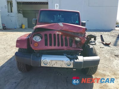 Piąte zdjęcie samochodu w środku: 2012 JEEP WRANGLER UNLIMITED SAHARA VIN:1C4BJWEG6CL157078 - miniatura