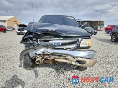 Piąte zdjęcie samochodu w środku: 2000 FORD F150 VIN:1FTRX18L5YKA03421 - miniatura