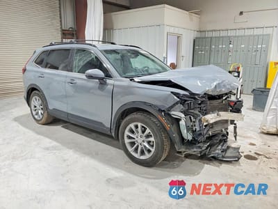 Czwarte zdjęcie samochodu z boku: 2023 HONDA CR-V EXL VIN:2HKRS4H74PH436535 - miniatura