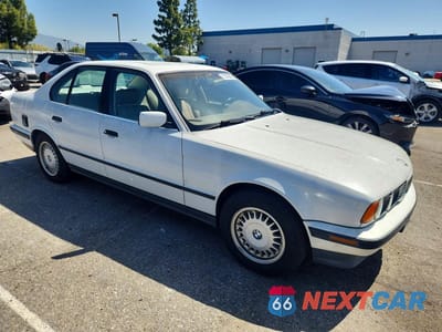 Czwarte zdjęcie samochodu z boku: 1994 BMW 525 I AUTOMATIC VIN:WBAHD6327RGK43510 - miniatura
