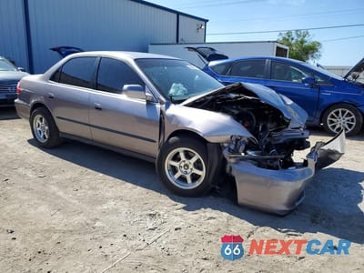 Czwarte zdjęcie samochodu z boku: 2000 HONDA ACCORD LX VIN:1HGCG1643YA048169 - miniatura