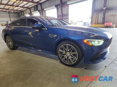 Czwarte zdjęcie samochodu z boku: 2022 MERCEDES-BENZ AMG GT 43 VIN:W1K7X5KB9NA045810 - miniatura