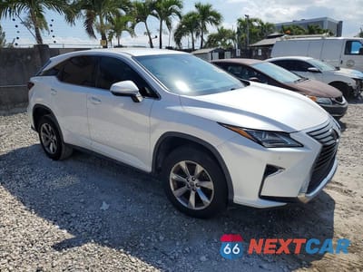 Czwarte zdjęcie samochodu z boku: 2019 LEXUS RX 350 BASE VIN:2T2ZZMCA4KC140386 - miniatura