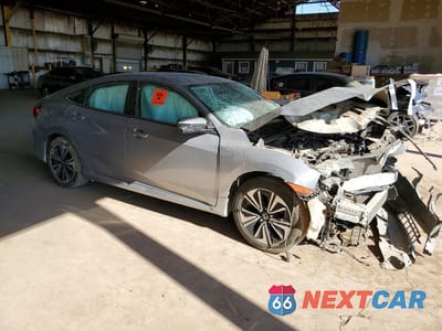 Czwarte zdjęcie samochodu z boku: 2016 HONDA CIVIC EXL VIN:19XFC1F74GE020717 - miniatura