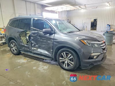 Czwarte zdjęcie samochodu z boku: 2016 HONDA PILOT EXL VIN:5FNYF6H52GB089084 - miniatura