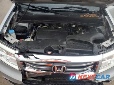 Zdjęcie 12 z 14 samochodu: 2014 HONDA PILOT EXL VIN:5FNYF4H56EB051939 - miniatura