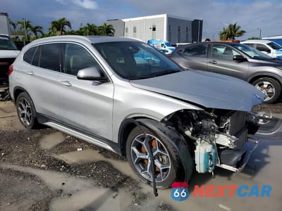 Czwarte zdjęcie samochodu z boku: 2018 BMW X1 XDRIVE28I VIN:WBXHT3C32J3H32816 - miniatura