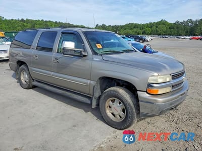 Czwarte zdjęcie samochodu z boku: 2002 CHEVROLET SUBURBAN K1500 VIN:1GNFK16ZX2J225580 - miniatura