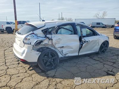 Trzecie zdjęcie samochodu z tyłu: 2012 FORD FOCUS TITANIUM VIN:1FAHP3N27CL428473 - miniatura