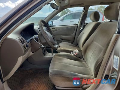 Zdjęcie 7 z 11 samochodu: 2001 TOYOTA COROLLA CE VIN:1NXBR12E51Z422767 - miniatura
