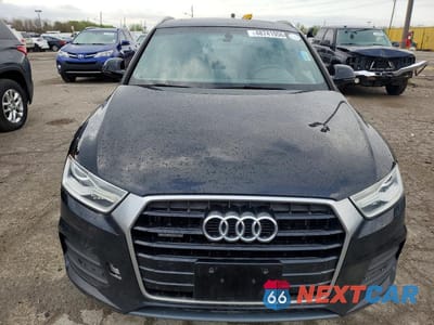 Piąte zdjęcie samochodu w środku: 2016 AUDI Q3 PREMIUM PLUS VIN:WA1EFCFS6GR013012 - miniatura