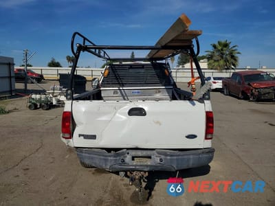 Zdjęcie 6 z 11 samochodu: 2003 FORD F250 SUPER DUTY VIN:1FTNF20L73EC44911 - miniatura