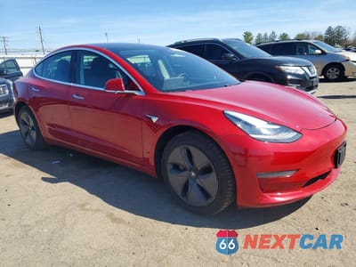 Czwarte zdjęcie samochodu z boku: 2020 TESLA MODEL 3 VIN:5YJ3E1EA2LF796858 - miniatura