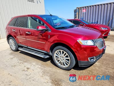 Czwarte zdjęcie samochodu z boku: 2015 LINCOLN MKX VIN:2LMDJ8JK3FBL31059 - miniatura