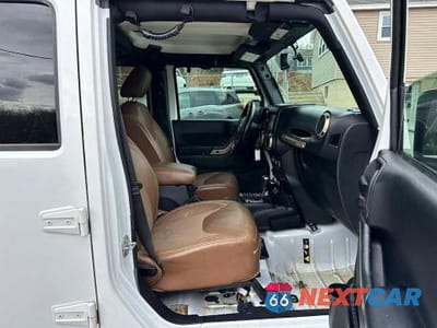 Zdjęcie 7 z 10 samochodu: 2017 JEEP WRANGLER UNLIMITED SAHARA VIN:1C4BJWEG9HL537281 - miniatura