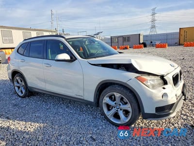 Czwarte zdjęcie samochodu z boku: 2015 BMW X1 XDRIVE35I VIN:WBAVM5C54FVV94177 - miniatura