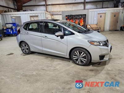 Czwarte zdjęcie samochodu z boku: 2015 HONDA FIT EX VIN:3HGGK5H81FM751471 - miniatura