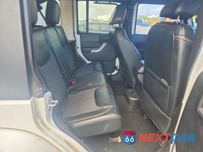 Zdjęcie 10 z 11 samochodu: 2015 JEEP WRANGLER UNLIMITED SPORT VIN:1C4BJWDG1FL572816 - miniatura