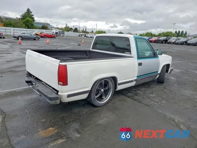 Trzecie zdjęcie samochodu z tyłu: 1990 GMC SIERRA C1500 VIN:1GTDC14K6LZ552872 - miniatura
