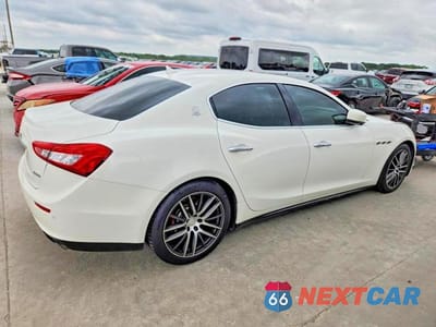 Trzecie zdjęcie samochodu z tyłu: 2014 MASERATI GHIBLI S VIN:ZAM57RTA3E1113173 - miniatura